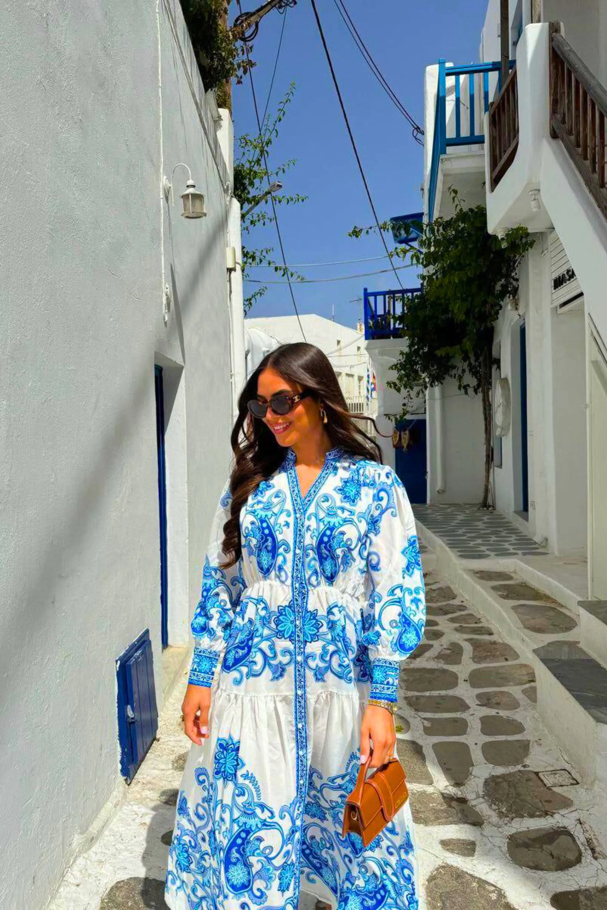 Step into elegance with the Lara Long Sleeve Floral Maxi Dress