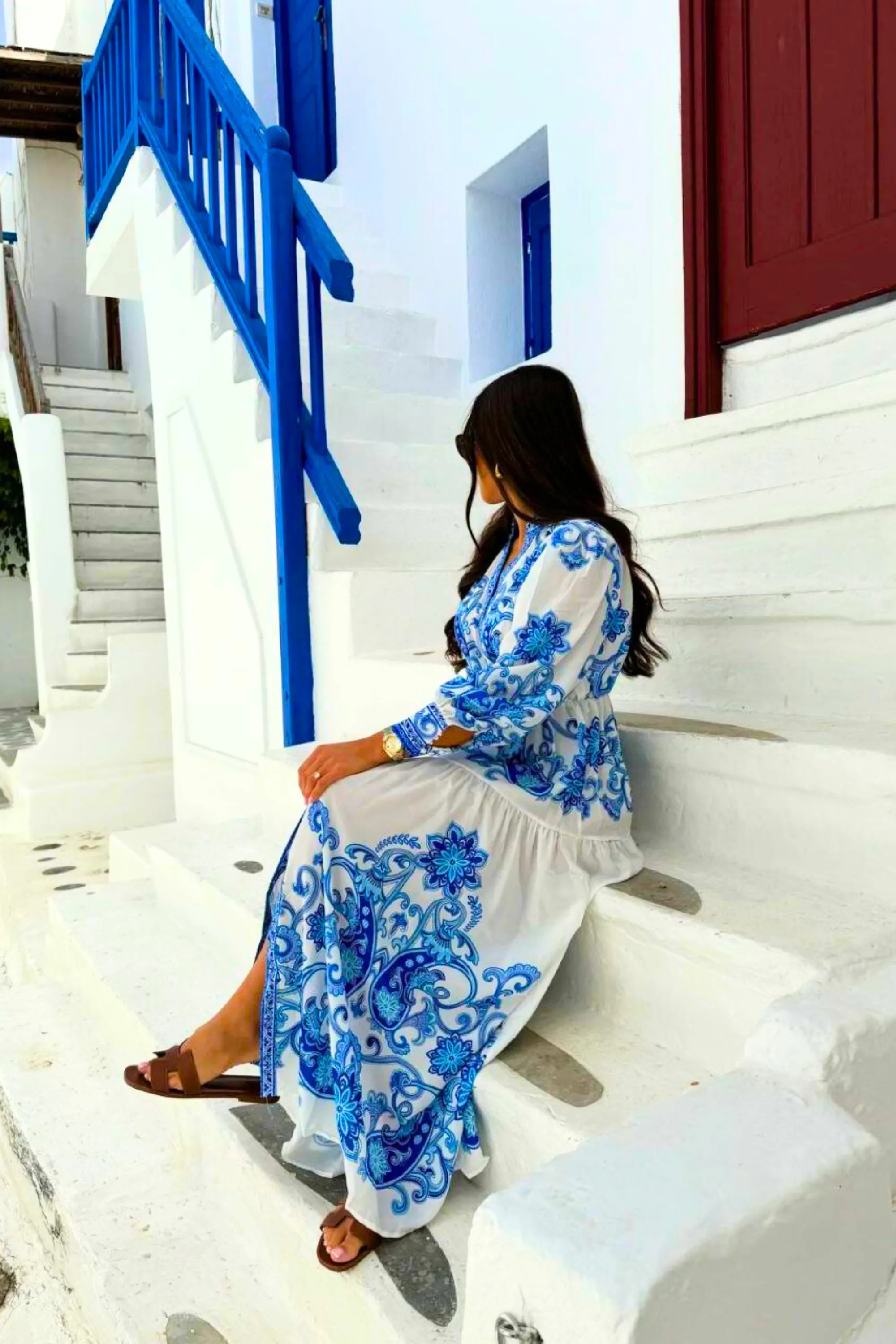 Step into elegance with the Lara Long Sleeve Floral Maxi Dress