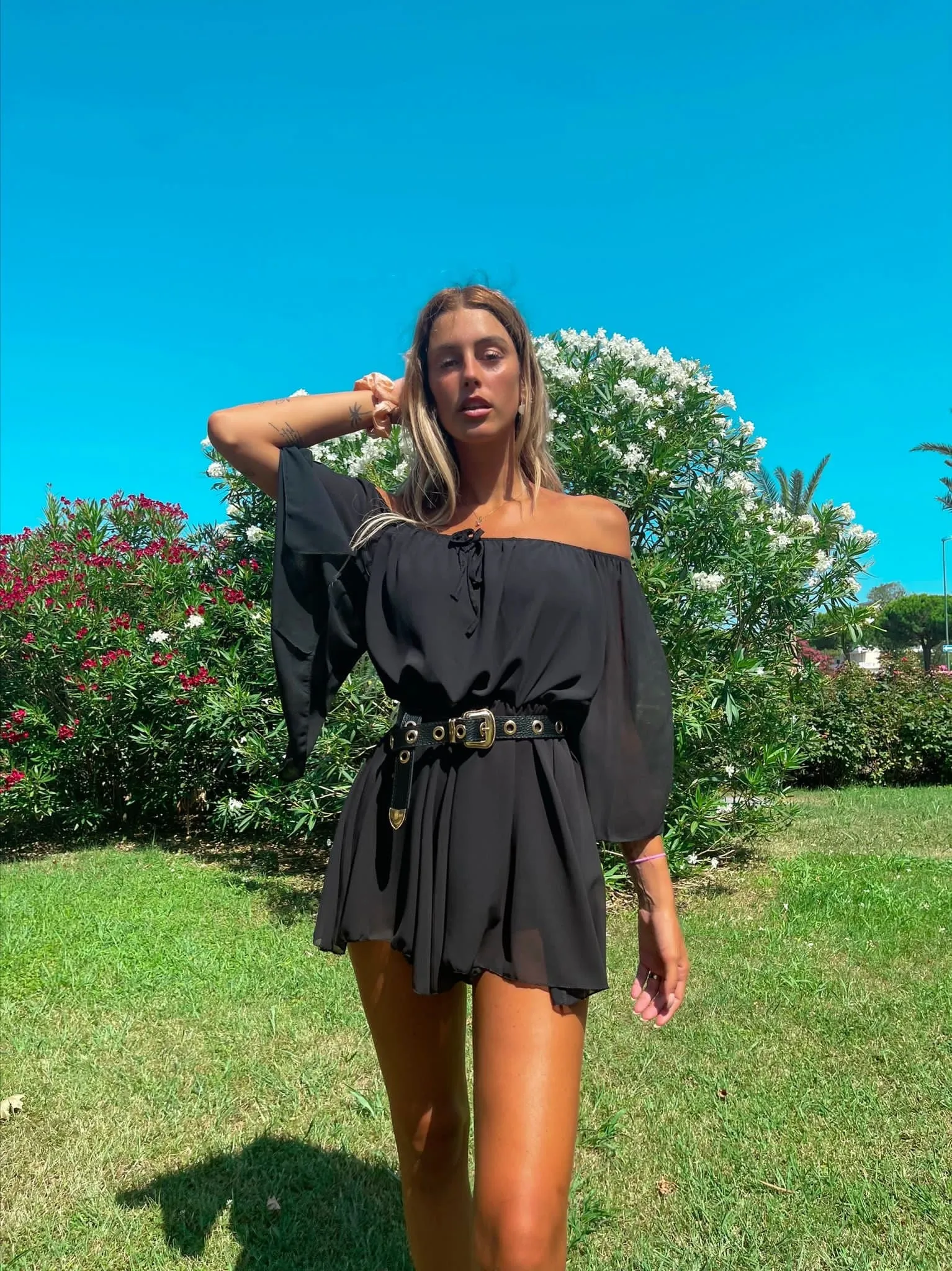 Tutina maniche velate scollo a barchetta
