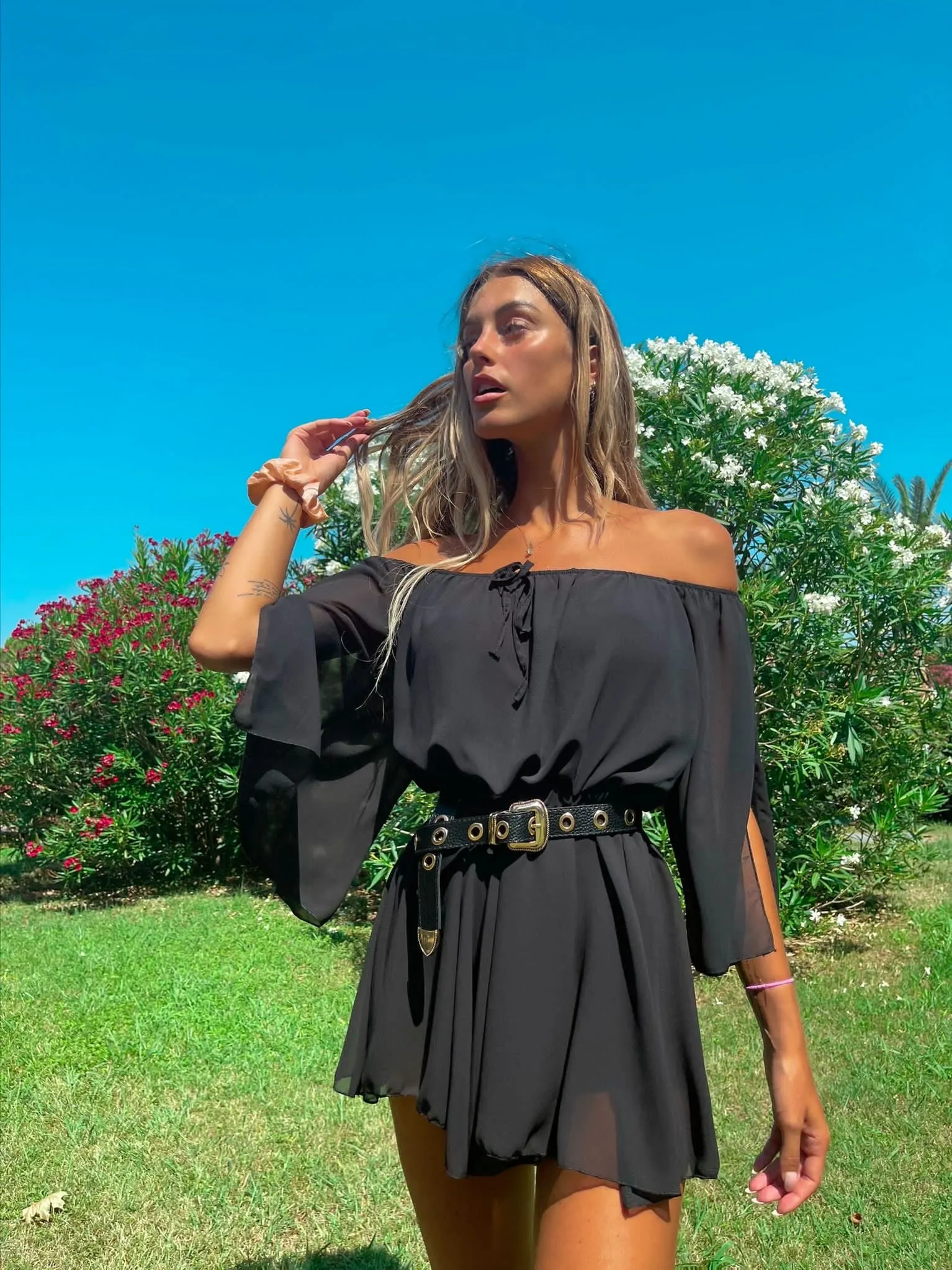 Tutina maniche velate scollo a barchetta